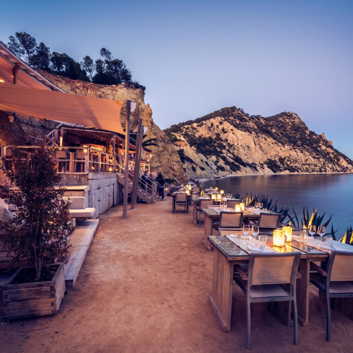 beach club in Ibiza on the beach overlooking the sea 