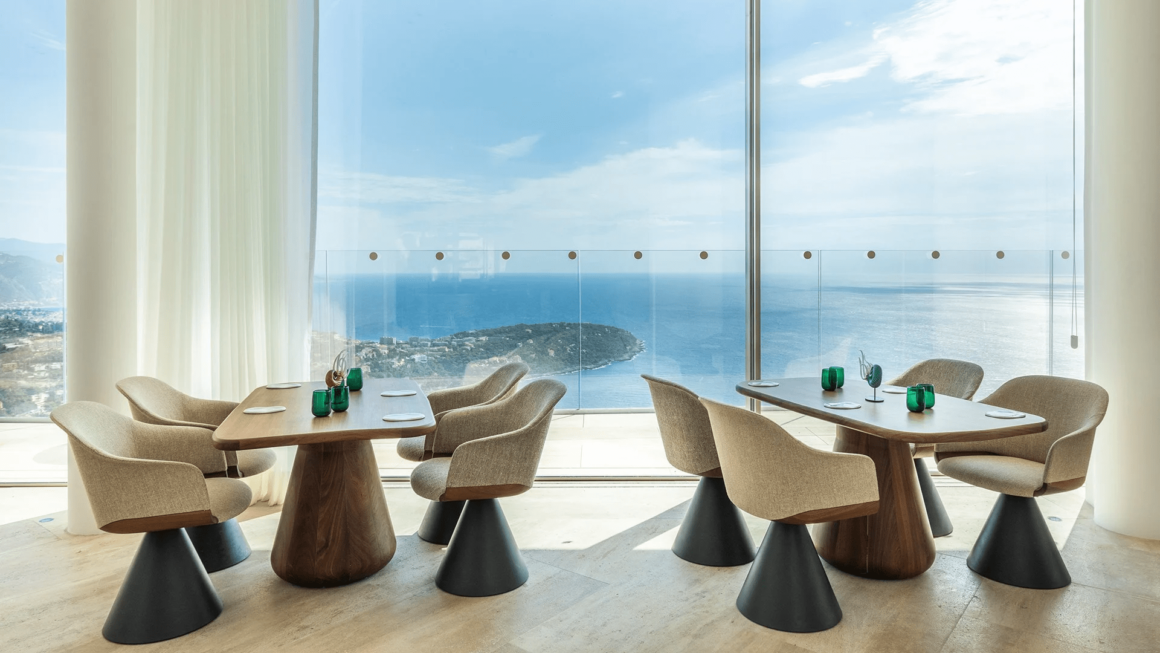 "Elegant hotel in Monaco with breathtaking panoramic views of the azure Mediterranean Sea."