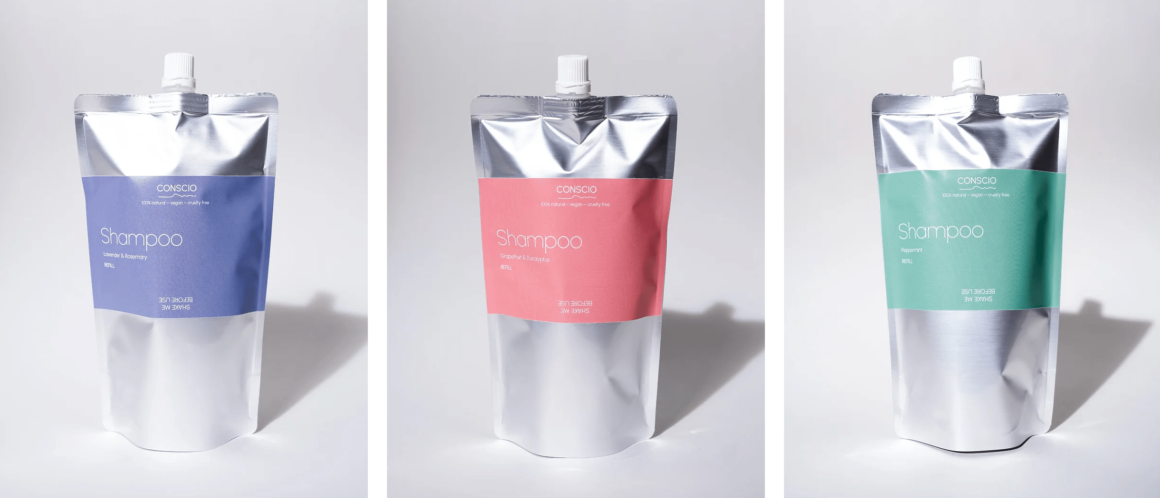 Een afbeelding van CONSCIO's natuurlijke shampoo, netjes verpakt in een herbruikbare aluminium fles, klaar om je haar zacht en gehydrateerd te laten aanvoelen.