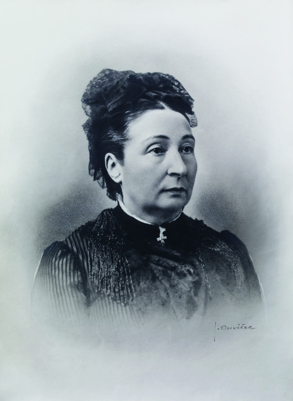 Portret van Anne-Rosine Noilly, een elegante vrouw uit de 19e eeuw, met vastberaden blik, kenmerkend voor haar rol als pionier en zakenvrouw in de vermoutindustrie.